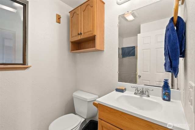 1412 Storm King Ave, Ocean Shores, WA 98569 - bathroom featuring toilet and vanity