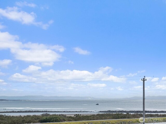 1412 Storm King Ave, Ocean Shores, WA 98569 - water view featuring a mountainous background