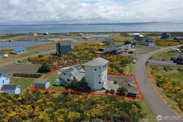 1412 Storm King Ave, Ocean Shores, WA 98569 - aerial overview of property's location with property boundaries highlighted and a large body of water