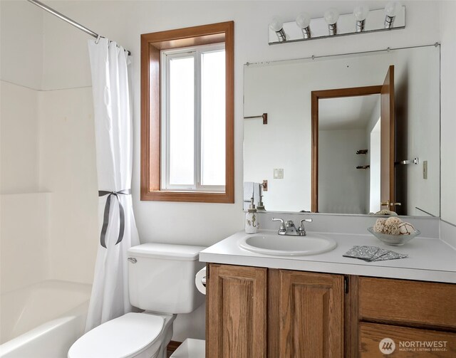 1442 SW Ponsteen Dr, Oak Harbor, WA 98277 - full bathroom featuring plenty of natural light, toilet, vanity, and shower / tub combo