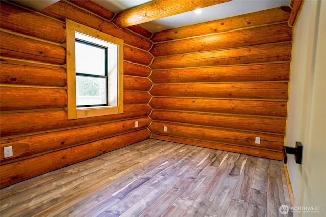 315 Skate Creek Rd N, Ashford, WA 98304 - spare room featuring wood-type flooring, a relaxing sauna, and rustic walls