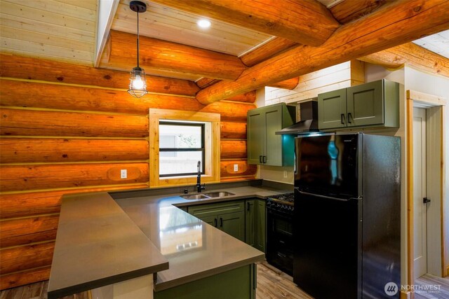 315 Skate Creek Rd N, Ashford, WA 98304 - kitchen with green cabinets, black appliances, a sink, wall chimney exhaust hood, and beamed ceiling