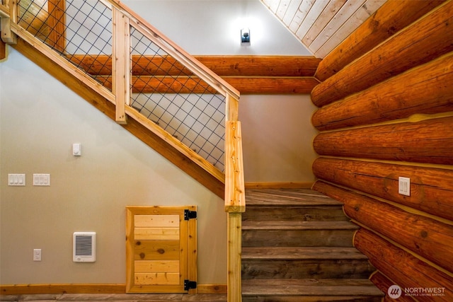 315 Skate Creek Rd N, Ashford, WA 98304 - stairway with rustic walls, baseboards, and wood ceiling