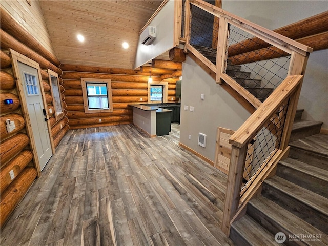 315 Skate Creek Rd N, Ashford, WA 98304 - bar featuring dark wood-style flooring, stairway, wooden ceiling, baseboards, and vaulted ceiling