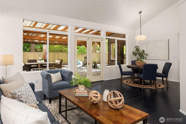 12423 NE 70th St, Kirkland, WA 98033 - living room featuring french doors, wood finished floors, baseboards, and lofted ceiling