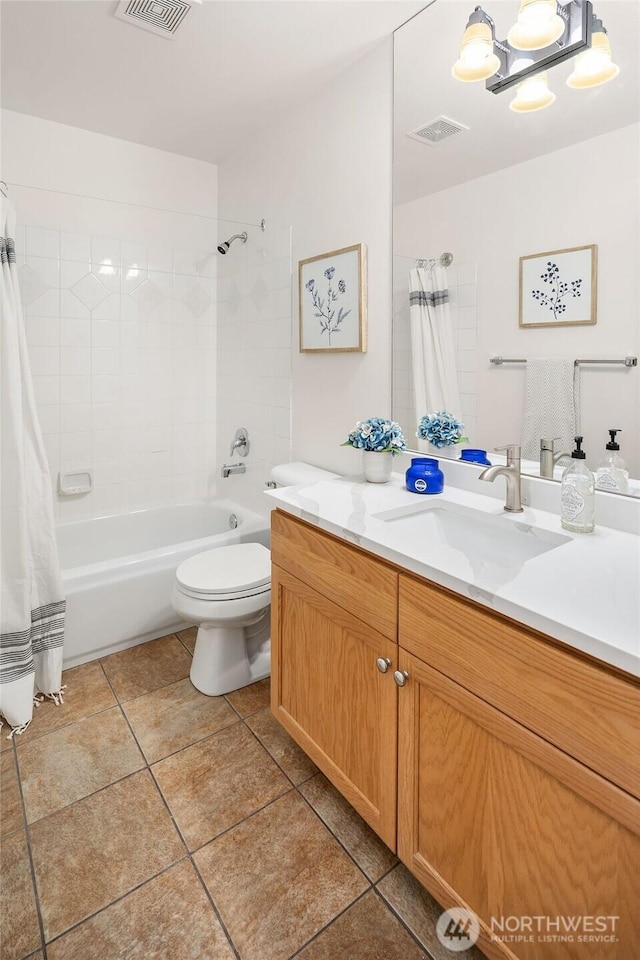 12423 NE 70th St, Kirkland, WA 98033 - full bathroom featuring toilet, shower / tub combo, tile patterned floors, and vanity