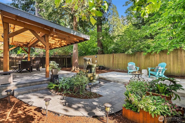 12423 NE 70th St, Kirkland, WA 98033 - view of patio with a fenced backyard
