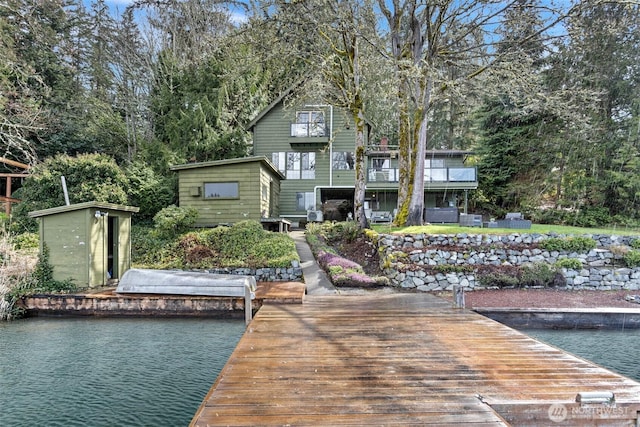 dock area with a water view