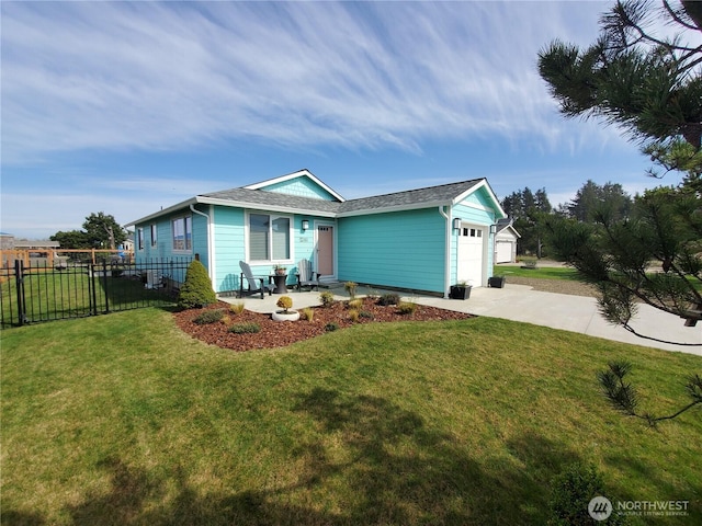 801 340th Pl, Ocean Park, WA 98640 - view of front of property with an attached garage, concrete driveway, fence, and a front lawn