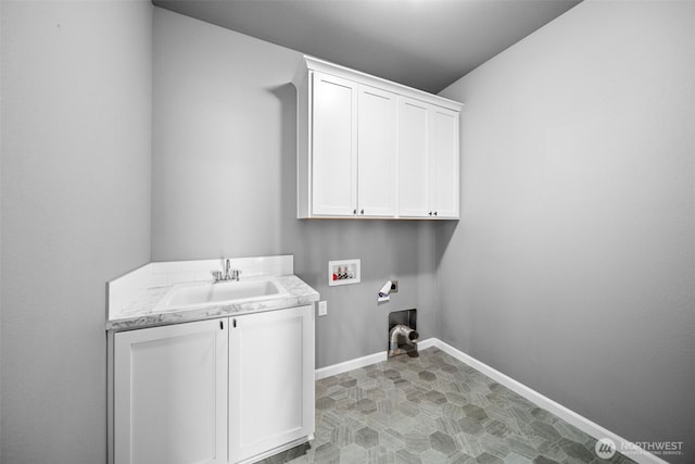 washroom featuring hookup for a washing machine, baseboards, cabinet space, electric dryer hookup, and a sink