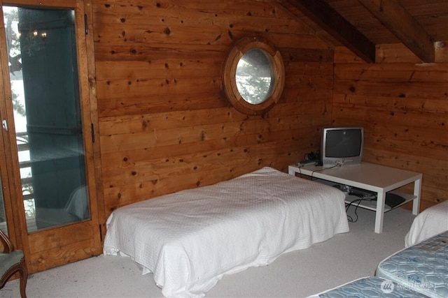 23 Brown Is, Brown Island, WA 98250 - bedroom featuring wood walls and multiple windows
