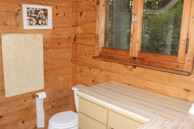 23 Brown Is, Brown Island, WA 98250 - half bath featuring wood walls, toilet, and a sauna