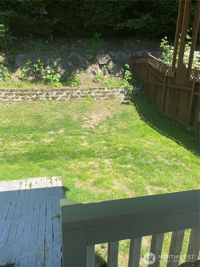 view of yard with a wooden deck