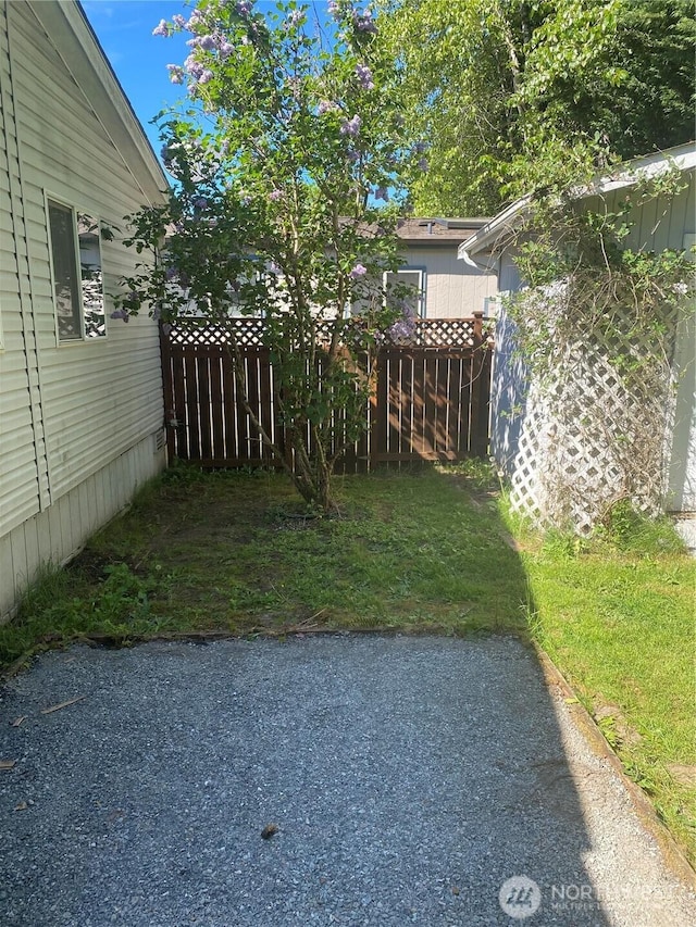 view of yard with fence