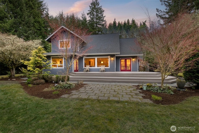 22789 S Kingston Rd NE, Kingston, WA 98346 - back of property at dusk with a lawn