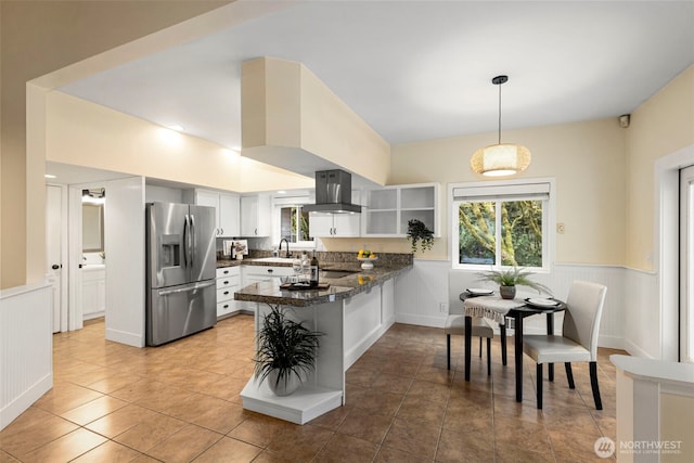 22789 S Kingston Rd NE, Kingston, WA 98346 - kitchen featuring a peninsula, open shelves, island exhaust hood, a sink, and stainless steel fridge