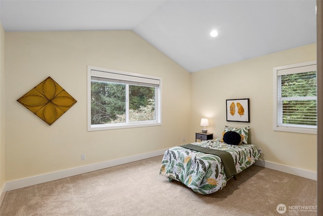 22789 S Kingston Rd NE, Kingston, WA 98346 - carpeted bedroom featuring vaulted ceiling, multiple windows, recessed lighting, and baseboards