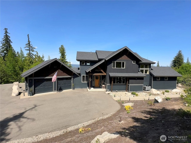 51 Trailside Dr, Cle Elum, WA 98922 - view of front of home with a detached garage and cooling unit