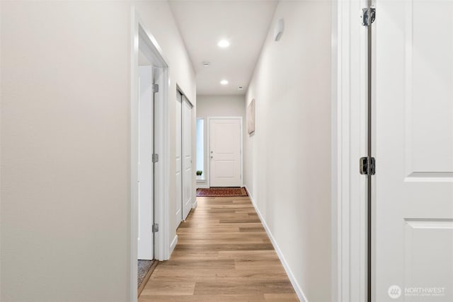 10414 113th Street Ct SW, Lakewood, WA 98498 - hallway featuring baseboards, light wood-style flooring, and recessed lighting