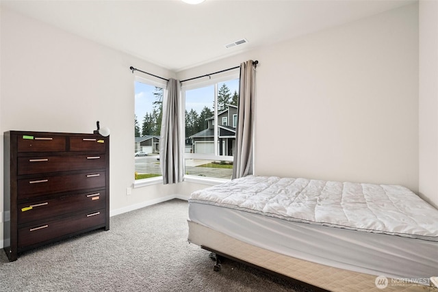 10414 113th Street Ct SW, Lakewood, WA 98498 - bedroom with baseboards, light colored carpet, and visible vents
