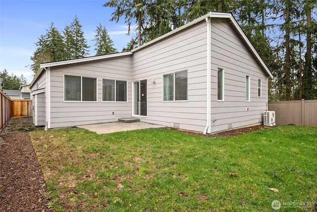 10414 113th Street Ct SW, Lakewood, WA 98498 - back of house featuring a fenced backyard, crawl space, a patio, and a yard