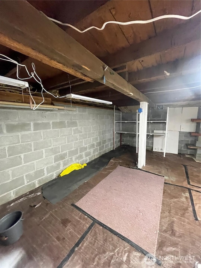 view of unfinished basement