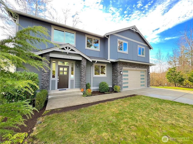 view of front of home with stone siding, concrete driveway, a garage, and a front lawn