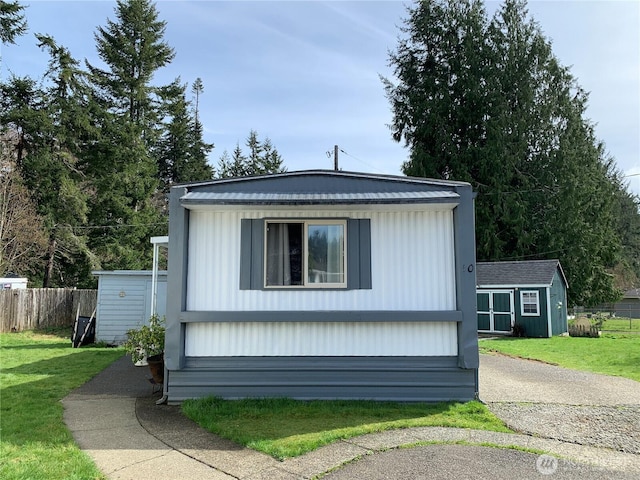 302 Pioneer Rd, Aberdeen, WA 98520 - view of property exterior featuring a storage unit