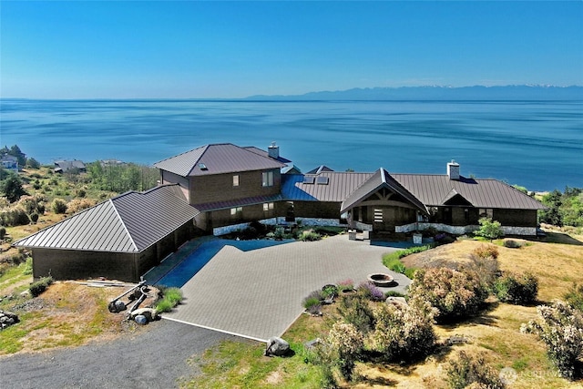 bird's eye view with a water view