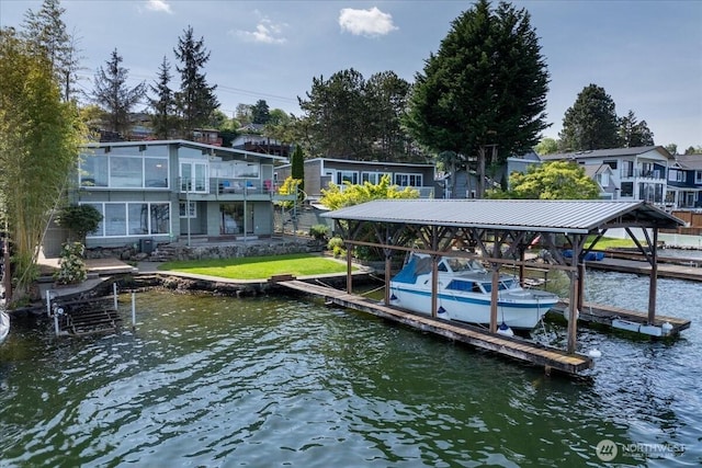 view of dock with a water view and boat lift