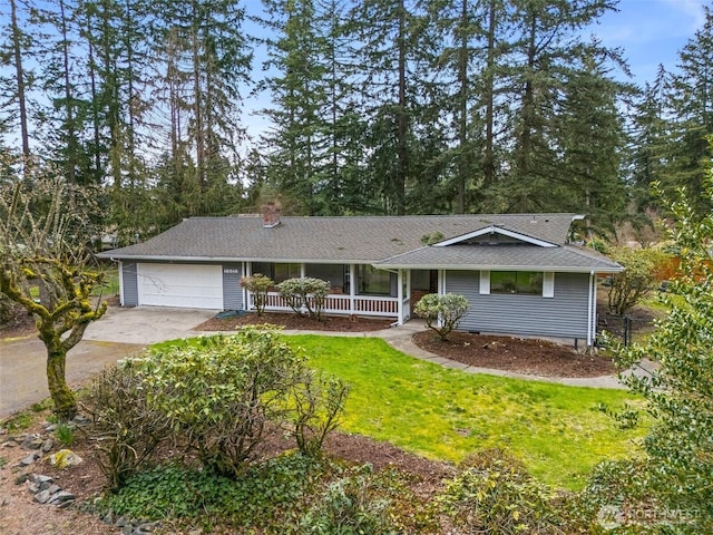 ranch-style home with concrete driveway, an attached garage, crawl space, a front yard, and covered porch