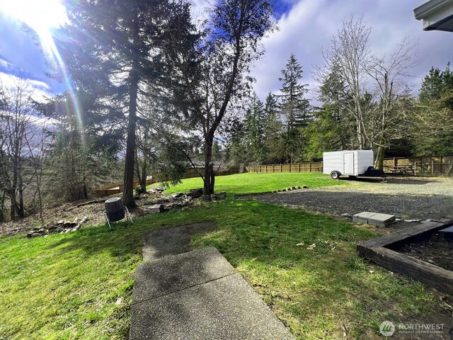view of yard with fence