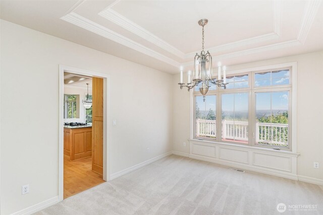 15832 SE 45th St, Bellevue, WA 98006 - unfurnished room with a tray ceiling, a wealth of natural light, and a chandelier