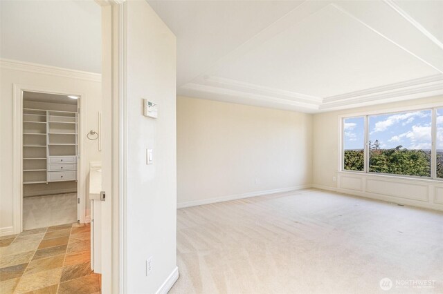 15832 SE 45th St, Bellevue, WA 98006 - empty room featuring ornamental molding, baseboards, a tray ceiling, and light colored carpet