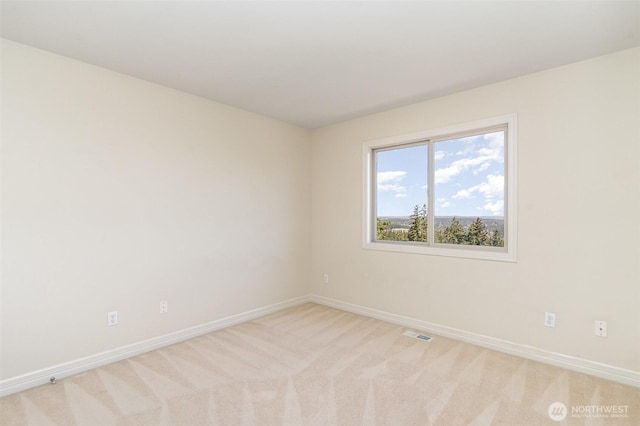 15832 SE 45th St, Bellevue, WA 98006 - empty room featuring baseboards, visible vents, and light carpet