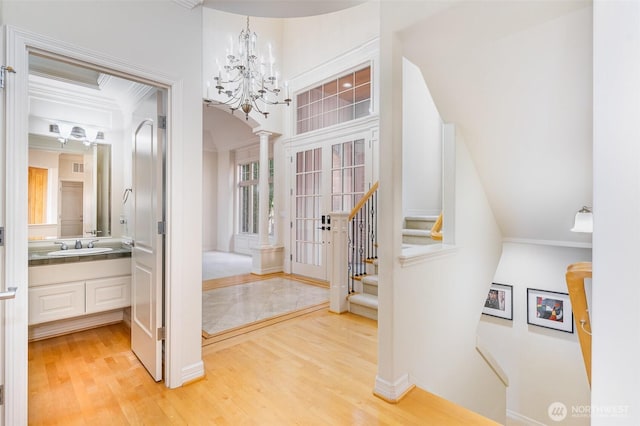 15832 SE 45th St, Bellevue, WA 98006 - interior space featuring vanity, crown molding, a chandelier, and wood finished floors