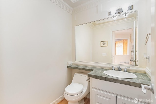 15832 SE 45th St, Bellevue, WA 98006 - half bathroom featuring toilet, vanity, and ornamental molding