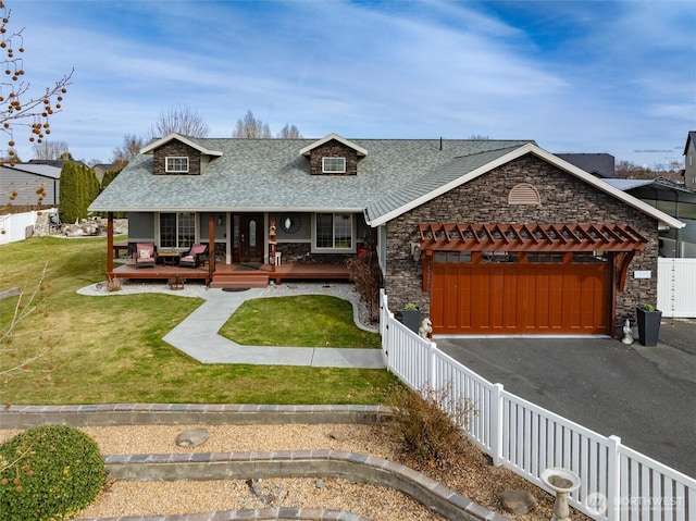 3609 Lakeshore Dr, Moses Lake, WA 98837 - view of front facade featuring stone siding, a shingled roof, a garage, a porch, and driveway