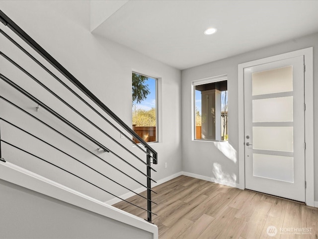 11521 SE 236th St, Kent, WA 98031 - entryway featuring light wood-style flooring, baseboards, stairway, and recessed lighting