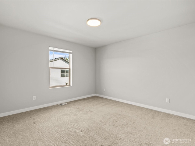 11521 SE 236th St, Kent, WA 98031 - spare room with baseboards and carpet
