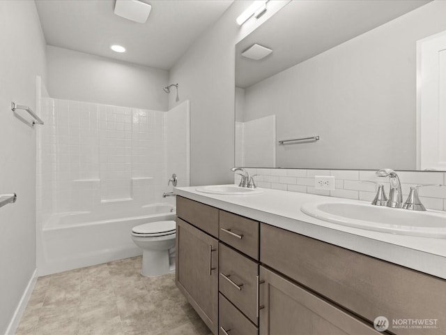 11521 SE 236th St, Kent, WA 98031 - full bathroom with toilet, double vanity, shower / bathtub combination, and baseboards