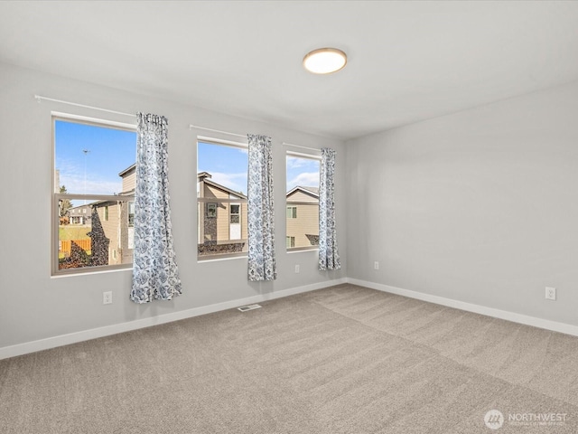 11521 SE 236th St, Kent, WA 98031 - unfurnished room with baseboards and carpet flooring