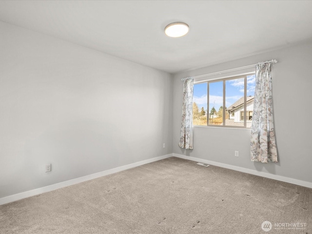 11521 SE 236th St, Kent, WA 98031 - carpeted empty room featuring baseboards