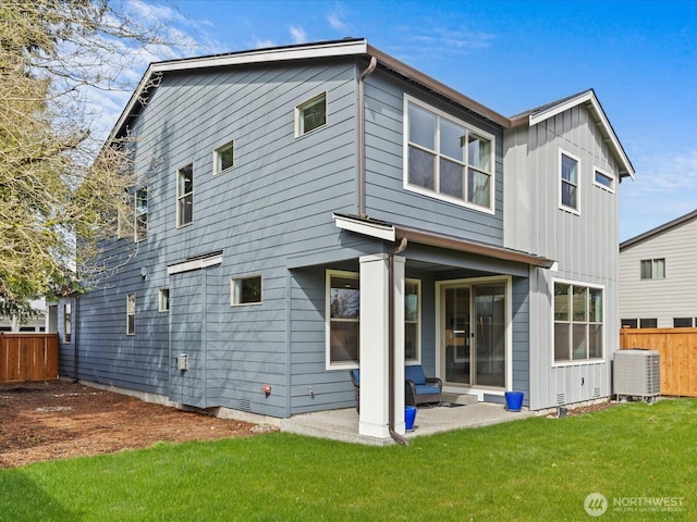 11521 SE 236th St, Kent, WA 98031 - rear view of property featuring central AC, a patio area, and board and batten siding