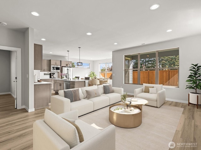 11521 SE 236th St, Kent, WA 98031 - living room with recessed lighting, baseboards, and light wood finished floors