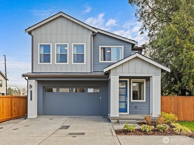 11521 SE 236th St, Kent, WA 98031 - view of front of property featuring board and batten siding, fence, concrete driveway, and a garage