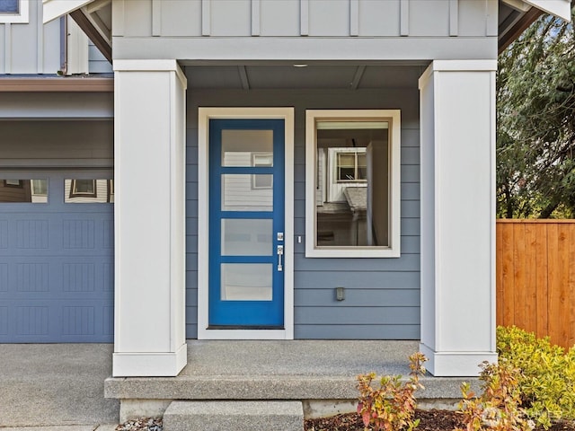 11521 SE 236th St, Kent, WA 98031 - view of exterior entry with board and batten siding and fence