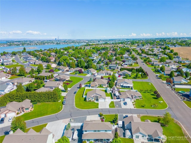 9500 SE Castlewood Dr, Moses Lake, WA 98837 - aerial view of residential area with a nearby body of water