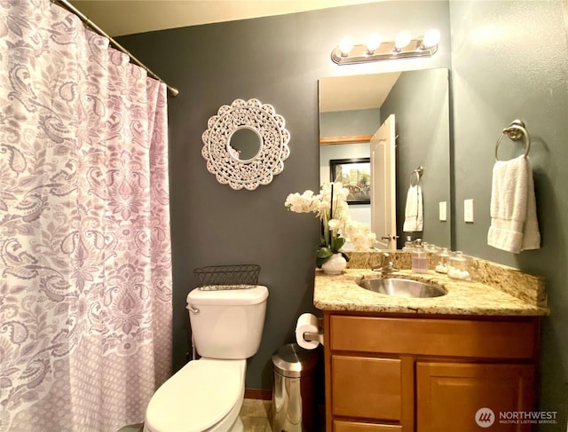 9500 SE Castlewood Dr, Moses Lake, WA 98837 - full bathroom with toilet, vanity, and a shower with curtain