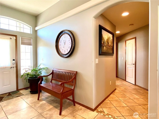 9500 SE Castlewood Dr, Moses Lake, WA 98837 - foyer entrance featuring arched walkways, light tile patterned floors, recessed lighting, and baseboards